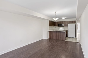 Living room of unit 238 located at 2355 Sheppard Avenue West in Etobicoke, Ontario listed by Marco Pedri, Broker with Shoreline Realty Corp., Brokerage.