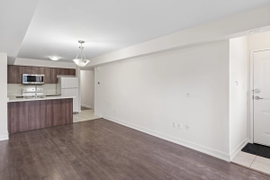 Living room of unit 238 located at 2355 Sheppard Avenue West in Etobicoke, Ontario listed by Marco Pedri, Broker with Shoreline Realty Corp., Brokerage.