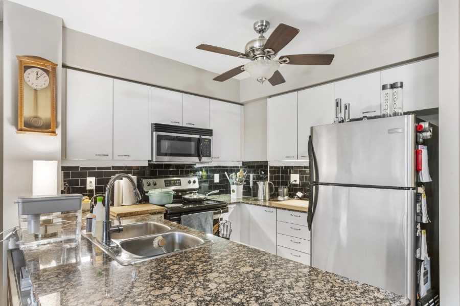 Kitchen of 1403 Royal York Road unit 306 located in Etobicoke which is listed by Etobicoke real estate agent Marco Pedri.