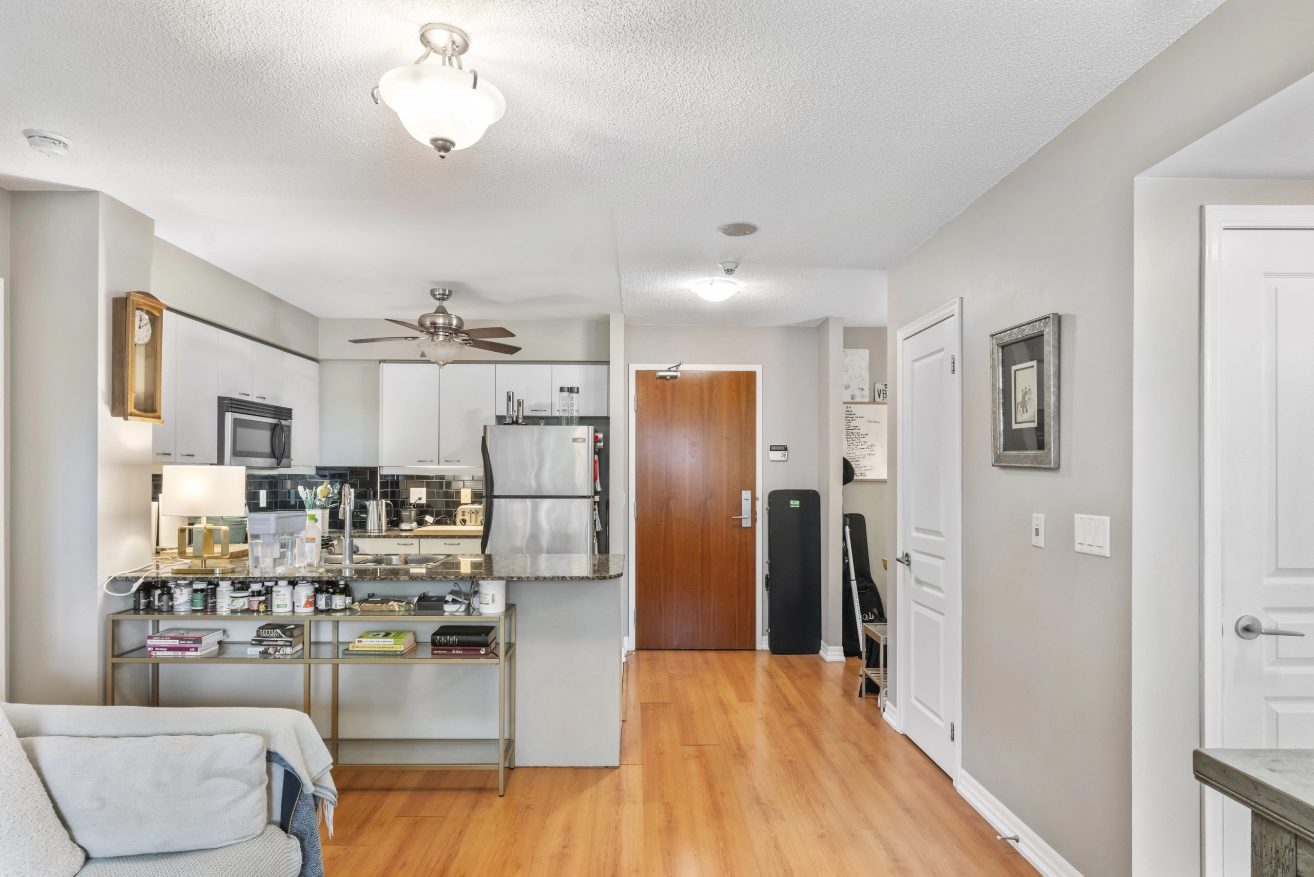 Kitchen and front entrance of 1403 Royal York Road unit 306 located in Etobicoke which is listed by Etobicoke real estate agent Marco Pedri.