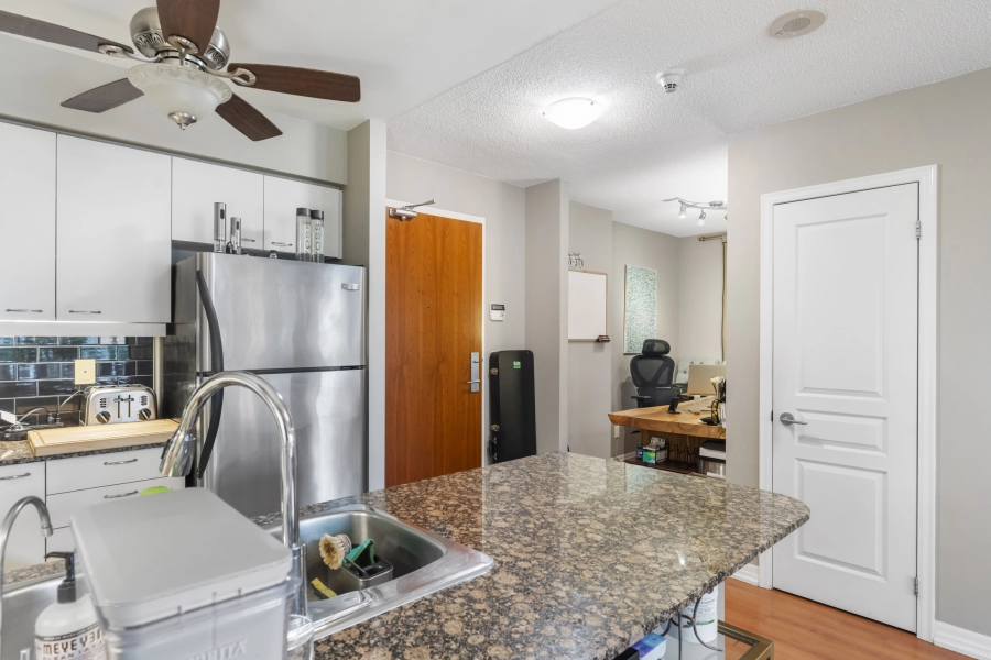 Kitchen of 1403 Royal York Road unit 306 located in Etobicoke which is listed by Etobicoke real estate agent Marco Pedri.