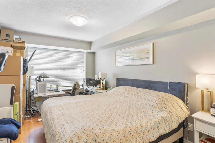Primary bedroom of 1403 Royal York Road unit 306 located in Etobicoke which is listed by Etobicoke real estate agent Marco Pedri.