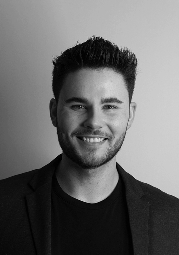 Black and white portrait headshot of Etobicoke real estate agent, Marco Pedri.